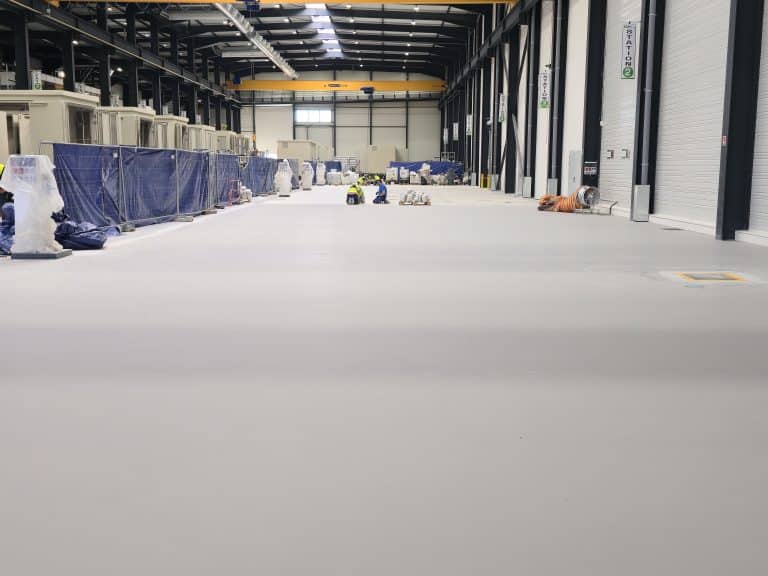 Application d'un autolissant polyuréthane ciment à La Fouillouse